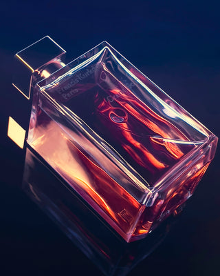 red and gold perfume bottle