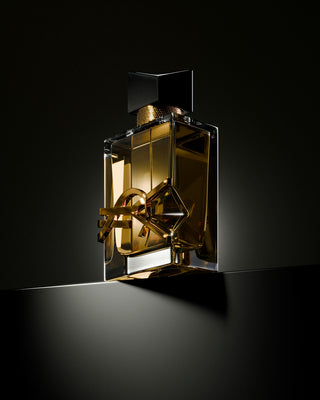 A bottle of perfume sitting on top of a table